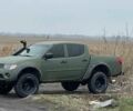 Зеленый Мицубиси Л 200, объемом двигателя 2.5 л и пробегом 260 тыс. км за 19000 $, фото 1 на Automoto.ua