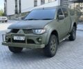 Зеленый Мицубиси Л 200, объемом двигателя 2.5 л и пробегом 155 тыс. км за 5499 $, фото 1 на Automoto.ua