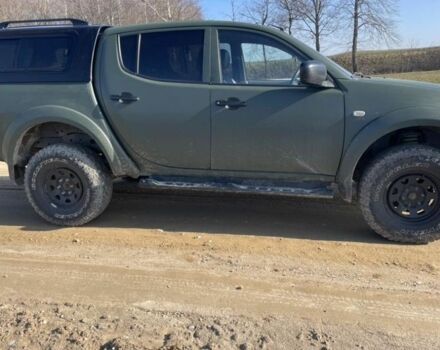 Зеленый Мицубиси Л 200, объемом двигателя 2.5 л и пробегом 263 тыс. км за 4200 $, фото 4 на Automoto.ua