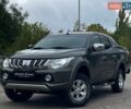 Зелений Міцубісі Л 200, об'ємом двигуна 2.44 л та пробігом 292 тис. км за 21499 $, фото 1 на Automoto.ua