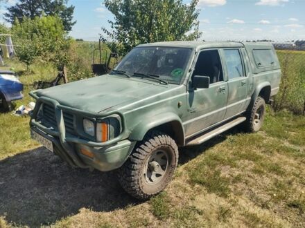 Мицубиси Л 200 1995 в Ромнах на Automoto.ua Зеленый Мицубиси Л 200, объемом двигателя 2.5 л и пробегом 400 тыс. км за 4700 $, фото 1 на Automoto.ua
