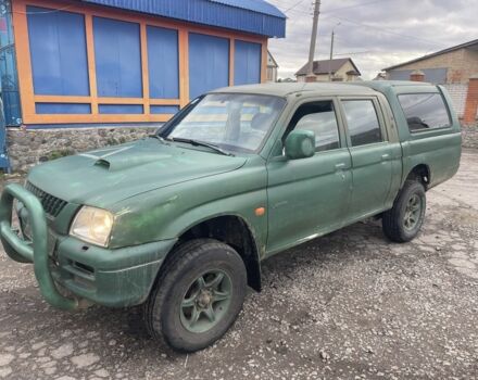 Зеленый Мицубиси Л 200, объемом двигателя 2.5 л и пробегом 250 тыс. км за 4500 $, фото 1 на Automoto.ua