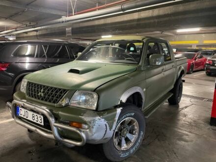 Мицубиси Л 200 2001 в Днепре (Днепропетровске) на Automoto.ua Зеленый Мицубиси Л 200, объемом двигателя 2.5 л и пробегом 125 тыс. км за 4200 $, фото 1 на Automoto.ua