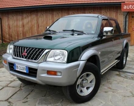 Зеленый Мицубиси Л 200, объемом двигателя 2.5 л и пробегом 240 тыс. км за 4000 $, фото 1 на Automoto.ua