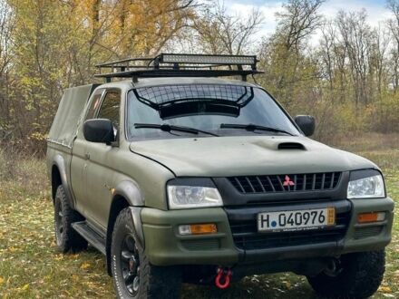 Мицубиси Л 200 2001 в Васильковке на Automoto.ua Зеленый Мицубиси Л 200, объемом двигателя 2.5 л и пробегом 280 тыс. км за 5700 $, фото 1 на Automoto.ua