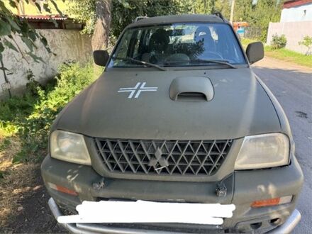 Мицубиси Л 200 2002 в Павлограде на Automoto.ua Зеленый Мицубиси Л 200, объемом двигателя 2.5 л и пробегом 245 тыс. км за 4000 $, фото 1 на Automoto.ua