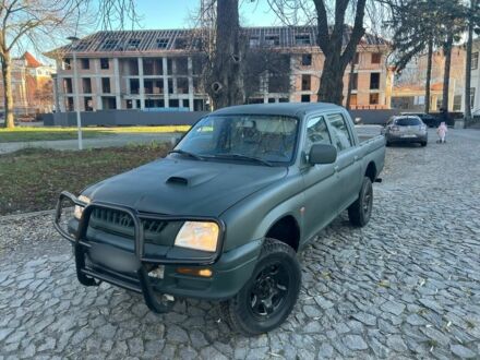 Зеленый Мицубиси Л 200, объемом двигателя 2.5 л и пробегом 287 тыс. км за 4700 $, фото 1 на Automoto.ua