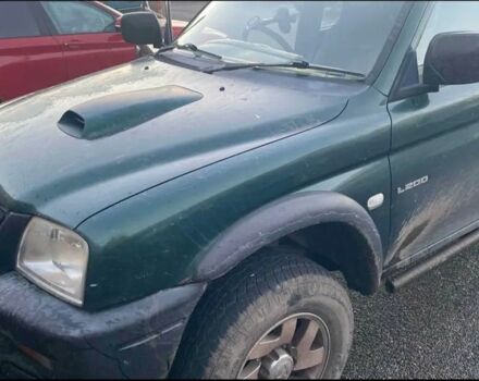 Зеленый Мицубиси Л 200, объемом двигателя 2.5 л и пробегом 180 тыс. км за 4709 $, фото 1 на Automoto.ua