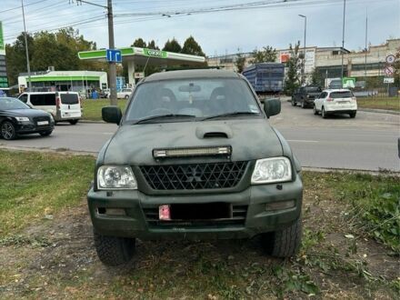 Зелений Міцубісі Л 200, об'ємом двигуна 2.5 л та пробігом 200 тис. км за 4005 $, фото 1 на Automoto.ua