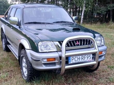 Зеленый Мицубиси Л 200, объемом двигателя 0 л и пробегом 244 тыс. км за 2642 $, фото 1 на Automoto.ua