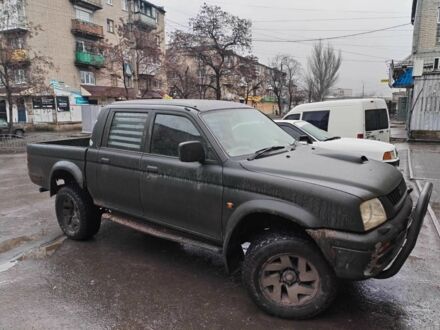 Зелений Міцубісі Л 200, об'ємом двигуна 2.5 л та пробігом 280 тис. км за 4379 $, фото 1 на Automoto.ua