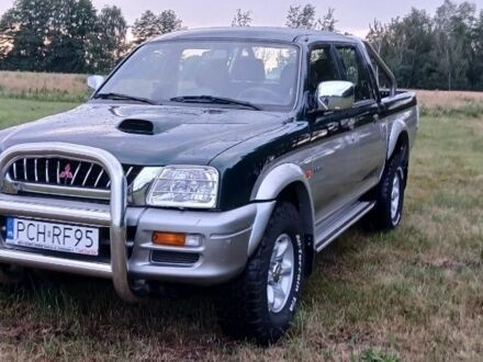 Зеленый Мицубиси Л 200, объемом двигателя 0 л и пробегом 211 тыс. км за 2600 $, фото 1 на Automoto.ua