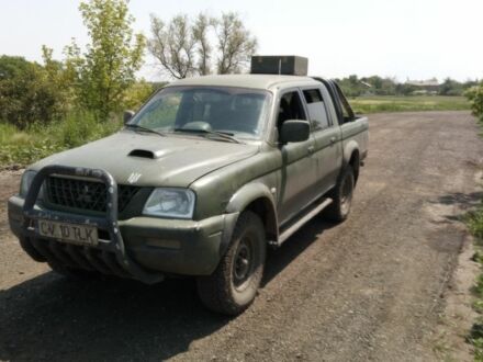 Мицубиси Л 200 2004 в Покровск (Красноармейск) на Automoto.ua Зеленый Мицубиси Л 200, объемом двигателя 0 л и пробегом 300 тыс. км за 4200 $, фото 1 на Automoto.ua
