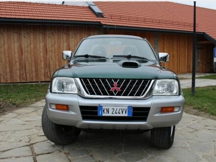 Зеленый Мицубиси Л 200, объемом двигателя 0 л и пробегом 124 тыс. км за 2600 $, фото 1 на Automoto.ua