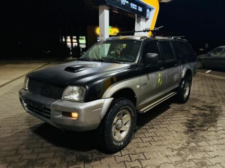 Зеленый Мицубиси Л 200, объемом двигателя 0 л и пробегом 130 тыс. км за 4500 $, фото 1 на Automoto.ua