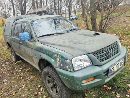 Зеленый Мицубиси Л 200, объемом двигателя 2.5 л и пробегом 250 тыс. км за 2620 $, фото 1 на Automoto.ua