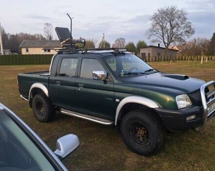 Зеленый Мицубиси Л 200, объемом двигателя 2.5 л и пробегом 264 тыс. км за 5537 $, фото 1 на Automoto.ua