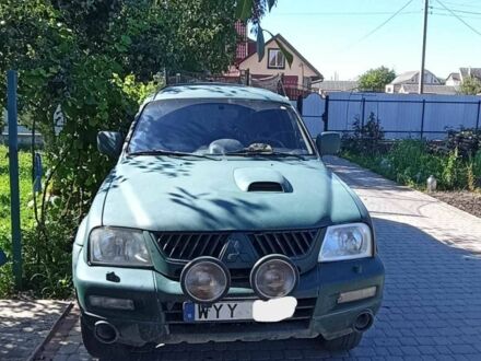 Зеленый Мицубиси Л 200, объемом двигателя 2.5 л и пробегом 303 тыс. км за 3800 $, фото 1 на Automoto.ua