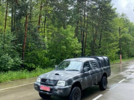 Мицубиси Л 200 2005 в Славуте на Automoto.ua Зеленый Мицубиси Л 200, объемом двигателя 2.5 л и пробегом 200 тыс. км за 4200 $, фото 1 на Automoto.ua