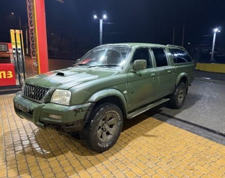 Зеленый Мицубиси Л 200, объемом двигателя 0 л и пробегом 200 тыс. км за 3700 $, фото 1 на Automoto.ua