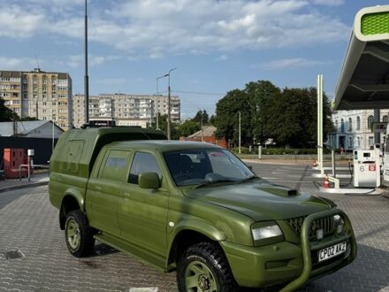 Мицубиси Л 200 2005 в Белой Церкве на Automoto.ua Зеленый Мицубиси Л 200, объемом двигателя 2.5 л и пробегом 100 тыс. км за 4200 $, фото 1 на Automoto.ua
