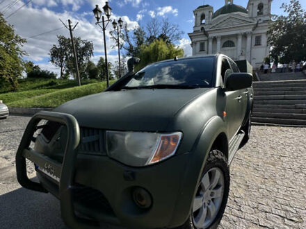 Мицубиси Л 200 2006 в Белой Церкве на Automoto.ua Зеленый Мицубиси Л 200, объемом двигателя 2.48 л и пробегом 367 тыс. км за 10900 $, фото 1 на Automoto.ua