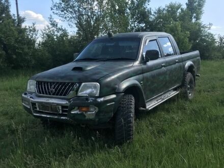 Мицубиси Л 200 2006 в Дружковке на Automoto.ua Зеленый Мицубиси Л 200, объемом двигателя 2.5 л и пробегом 180 тыс. км за 4000 $, фото 1 на Automoto.ua