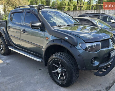 Зеленый Мицубиси Л 200, объемом двигателя 2.48 л и пробегом 466 тыс. км за 14000 $, фото 1 на Automoto.ua