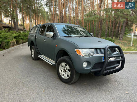 Мицубиси Л 200 2007 в Новомосковске на Automoto.ua Зеленый Мицубиси Л 200, объемом двигателя 2.5 л и пробегом 300 тыс. км за 10500 $, фото 1 на Automoto.ua