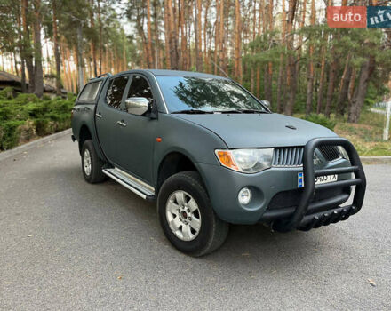 Мицубиси Л 200 2007 в Новомосковске на Automoto.ua Зеленый Мицубиси Л 200, объемом двигателя 2.5 л и пробегом 300 тыс. км за 10500 $, фото 1 на Automoto.ua
