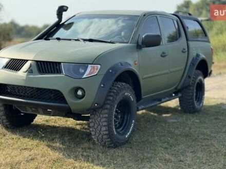 Мицубиси Л 200 2008 в Гадяче на Automoto.ua Зеленый Мицубиси Л 200, объемом двигателя 2.5 л и пробегом 265 тыс. км за 19000 $, фото 1 на Automoto.ua