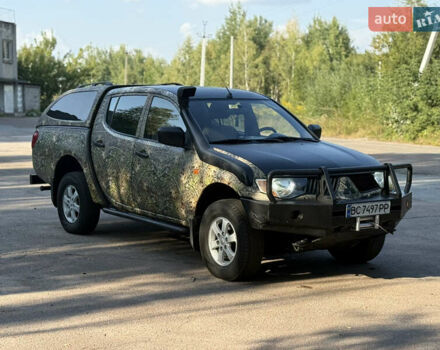 Зеленый Мицубиси Л 200, объемом двигателя 2.5 л и пробегом 362 тыс. км за 12300 $, фото 1 на Automoto.ua