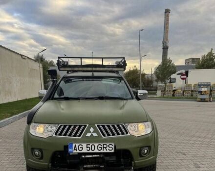 Зеленый Мицубиси Л 200, объемом двигателя 2.5 л и пробегом 242 тыс. км за 2900 $, фото 1 на Automoto.ua