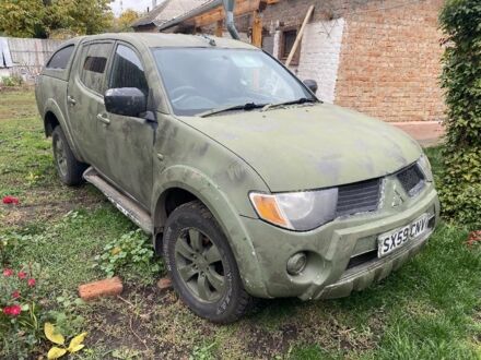 Мицубиси Л 200 2009 в Лохвице на Automoto.ua Зеленый Мицубиси Л 200, объемом двигателя 2.5 л и пробегом 80 тыс. км за 6000 $, фото 1 на Automoto.ua
