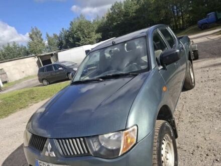 Зеленый Мицубиси Л 200, объемом двигателя 0 л и пробегом 231 тыс. км за 5484 $, фото 1 на Automoto.ua