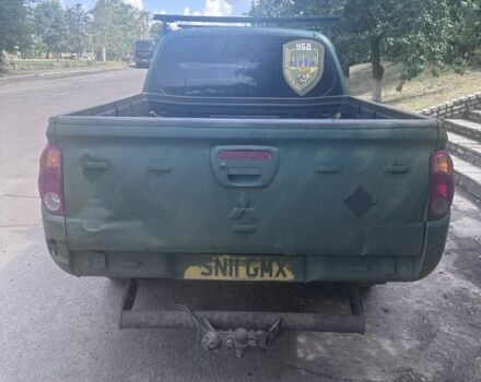 Зеленый Мицубиси Л 200, объемом двигателя 0 л и пробегом 150 тыс. км за 4631 $, фото 1 на Automoto.ua
