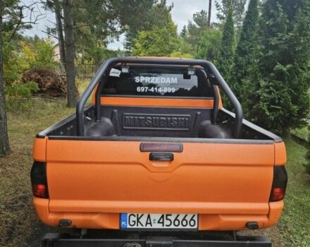 Мицубиси Л 200 2002 в Павлограде на Automoto.ua Оранжевый Мицубиси Л 200, объемом двигателя 2.5 л и пробегом 242 тыс. км за 2902 $, фото 2 на Automoto.ua