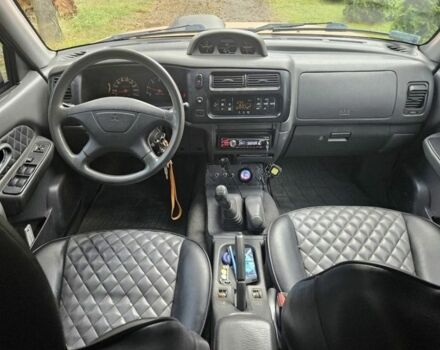 Мицубиси Л 200 2004 в Сумах на Automoto.ua Оранжевый Мицубиси Л 200, объемом двигателя 2.5 л и пробегом 199 тыс. км за 2864 $, фото 5 на Automoto.ua