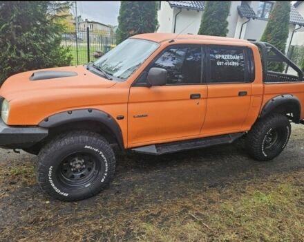 Мицубиси Л 200 2004 в Сумах на Automoto.ua Оранжевый Мицубиси Л 200, объемом двигателя 2.5 л и пробегом 199 тыс. км за 2864 $, фото 3 на Automoto.ua