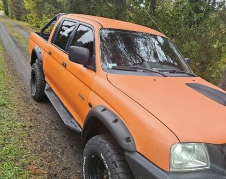 Мицубиси Л 200 2004 в Сумах на Automoto.ua Оранжевый Мицубиси Л 200, объемом двигателя 2.5 л и пробегом 199 тыс. км за 2864 $, фото 4 на Automoto.ua