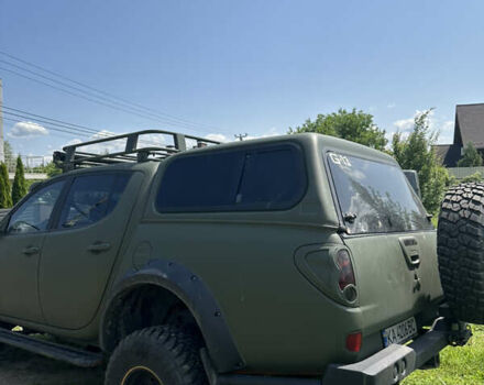 Оранжевый Мицубиси Л 200, объемом двигателя 2.48 л и пробегом 122 тыс. км за 18000 $, фото 3 на Automoto.ua