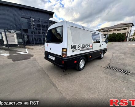 Белый Мицубиси Л300, объемом двигателя 2.5 л и пробегом 350 тыс. км за 2999 $, фото 5 на Automoto.ua
