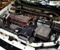 Білий Міцубісі Лансер Еволюшн, об'ємом двигуна 2 л та пробігом 169 тис. км за 25000 $, фото 23 на Automoto.ua