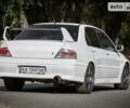 Білий Міцубісі Лансер Еволюшн, об'ємом двигуна 2 л та пробігом 169 тис. км за 25000 $, фото 3 на Automoto.ua