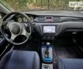 Білий Міцубісі Лансер Еволюшн, об'ємом двигуна 2 л та пробігом 169 тис. км за 25000 $, фото 25 на Automoto.ua