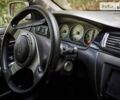 Білий Міцубісі Лансер Еволюшн, об'ємом двигуна 2 л та пробігом 169 тис. км за 25000 $, фото 13 на Automoto.ua