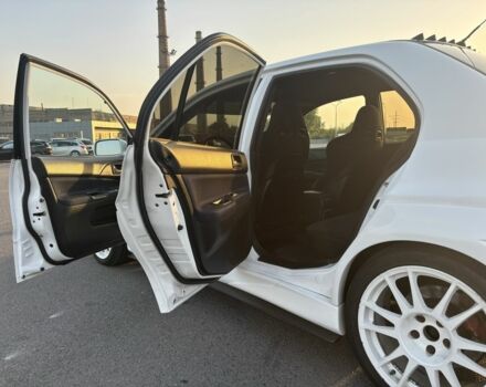 Белый Мицубиси Лансер Эволюшн, объемом двигателя 0 л и пробегом 179 тыс. км за 21499 $, фото 4 на Automoto.ua