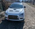 Білий Міцубісі Лансер Еволюшн, об'ємом двигуна 2 л та пробігом 200 тис. км за 14000 $, фото 3 на Automoto.ua