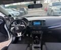 Білий Міцубісі Лансер Еволюшн, об'ємом двигуна 2 л та пробігом 82 тис. км за 6400 $, фото 9 на Automoto.ua