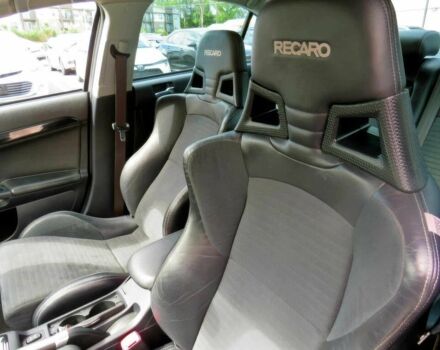 Белый Мицубиси Лансер Эволюшн, объемом двигателя 2 л и пробегом 86 тыс. км за 9900 $, фото 8 на Automoto.ua